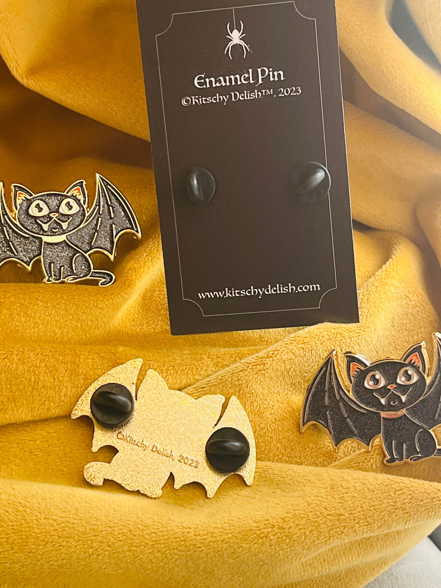Cat Bat Takes Flight enamel pin with glitter