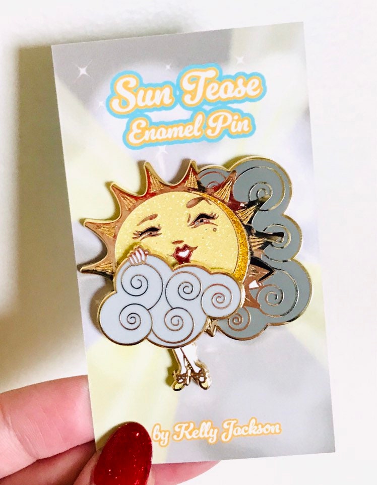 Sliding Cloud Sun Teaser hard enamel pin with glitter!