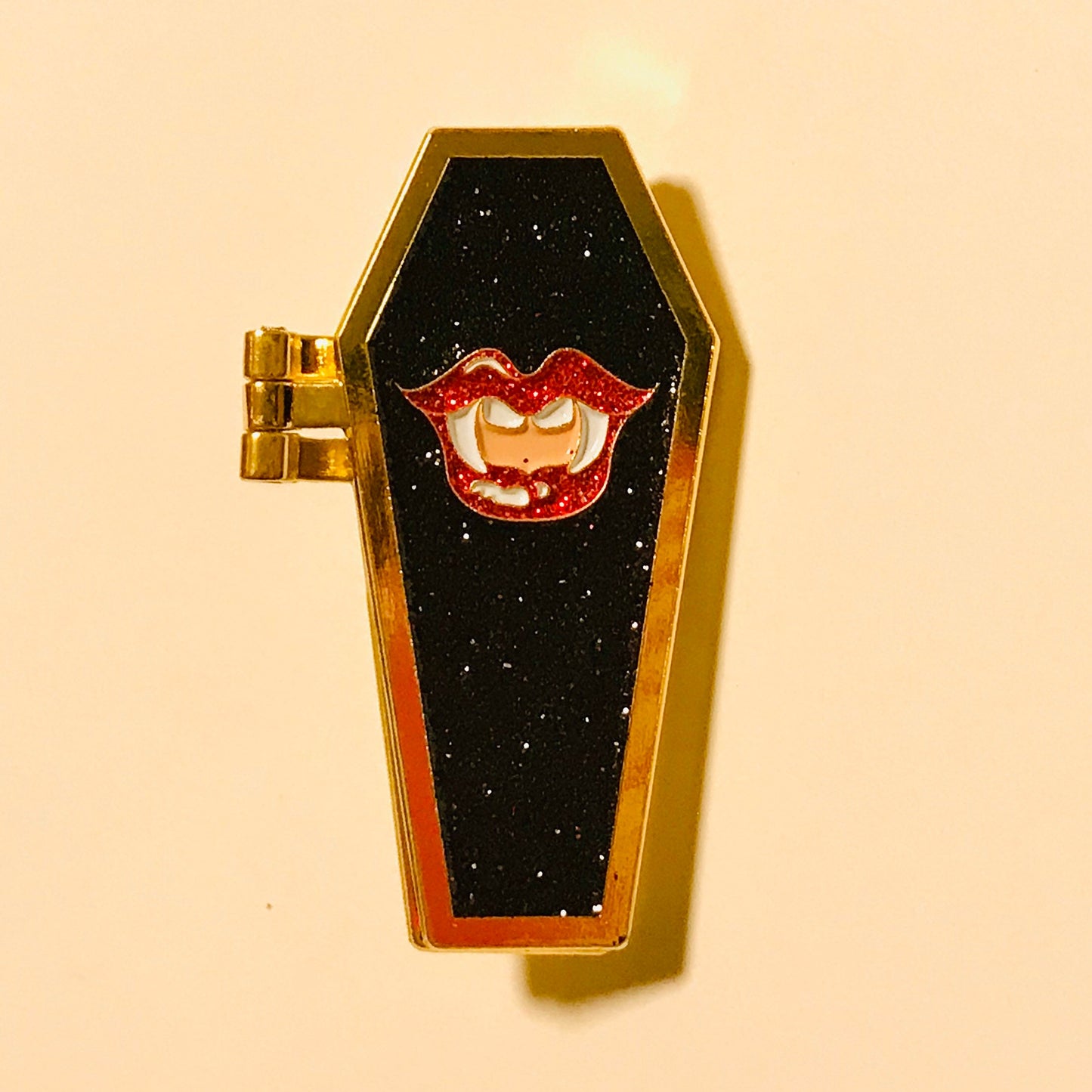 The Vamp, enamel hinge pin with glitter