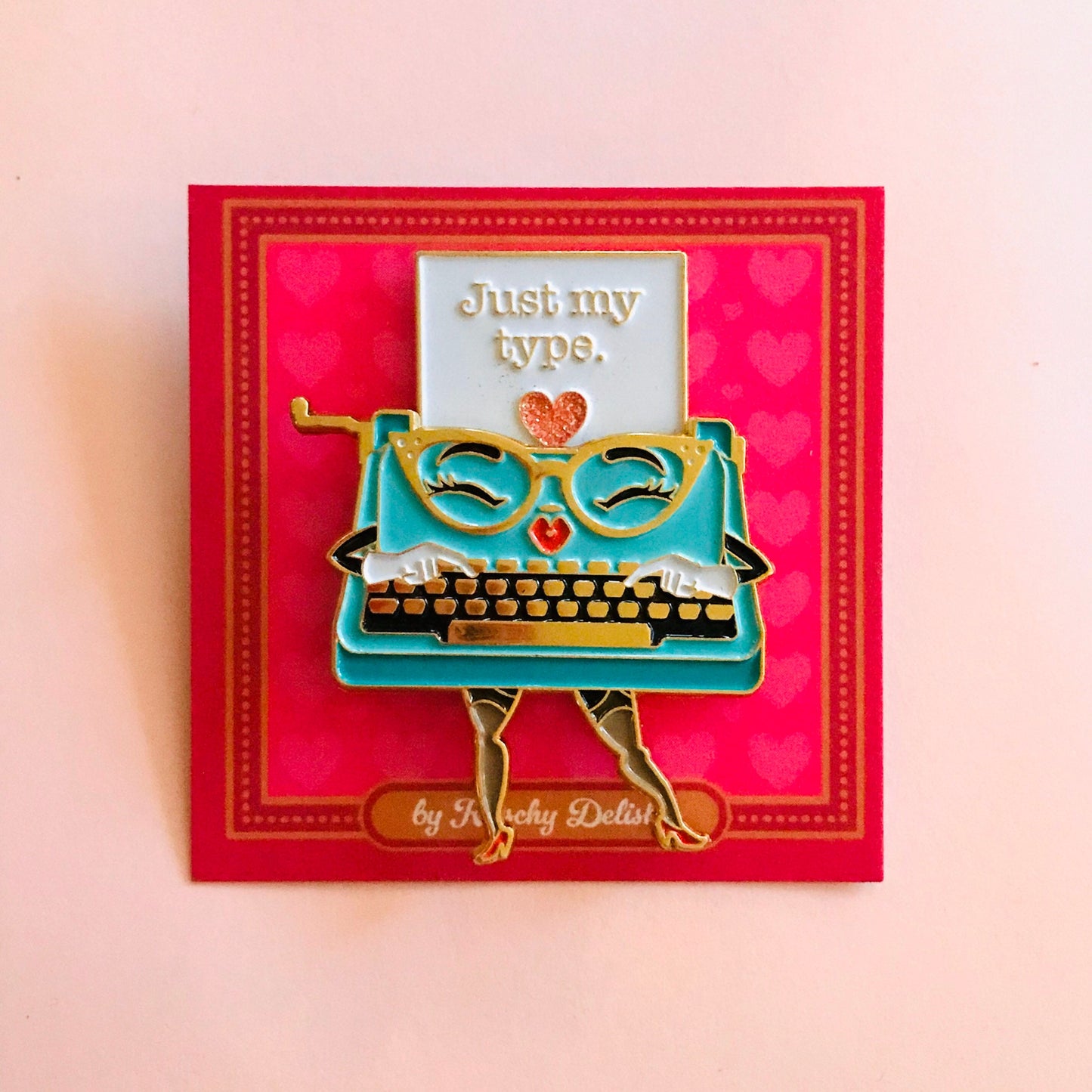 Just My Type, moving enamel pin