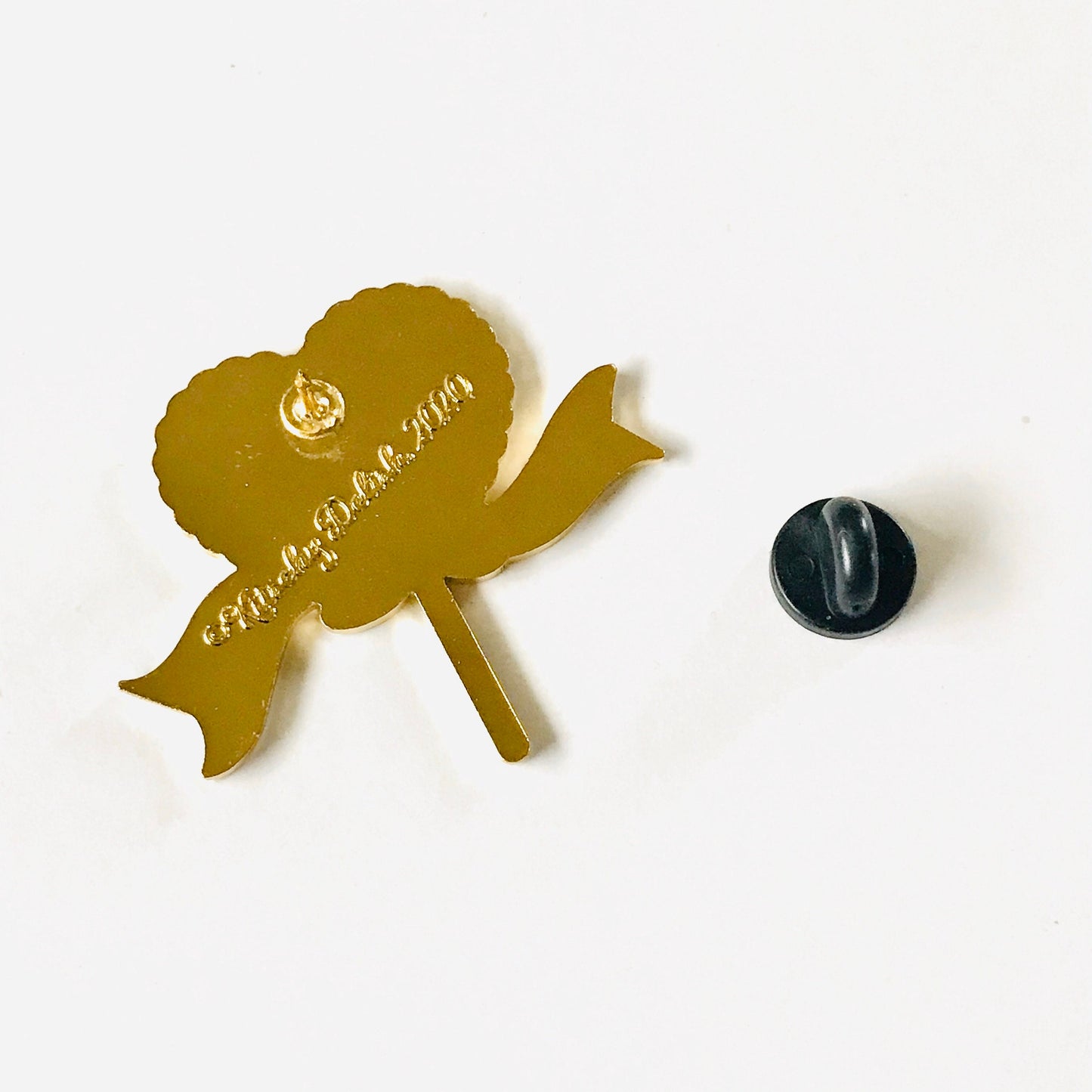 A Sucker For Love soft enamel pin with red glitter