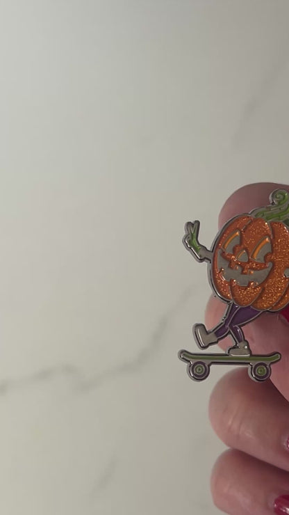 Rolling into Halloween Pumpkin enamel pin with glitter!